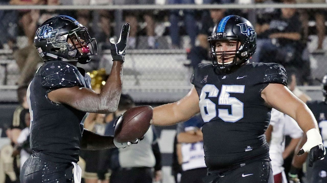 No. 9 UCF improves to 8-0 with 52-40 takedown of Temple